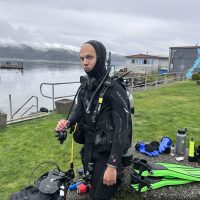 Photo Noah standing in a scuba suit