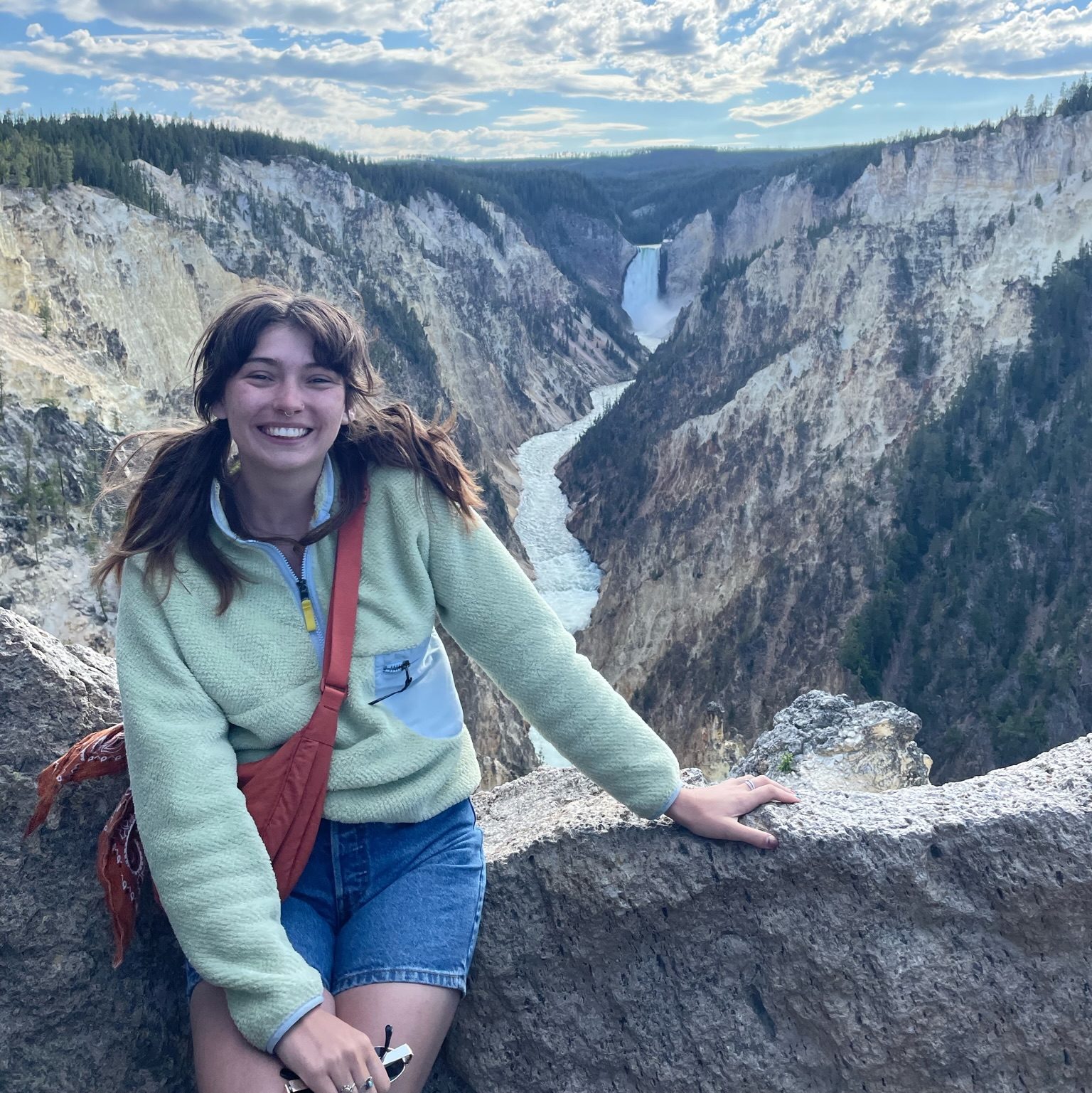Brooke Santos pfp in front of vast mountainscape